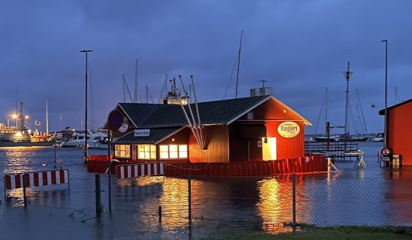 flood barriers around house protecting it from water