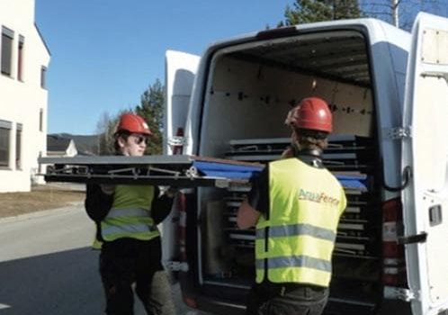 Taking AquaFence units from a van
