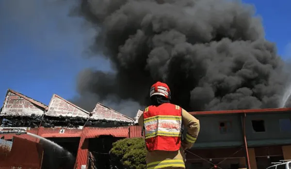 Firefighters extinguishing a fire breakout