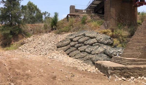 Pylon protection using Rock Bags to prevent scour during flash floods